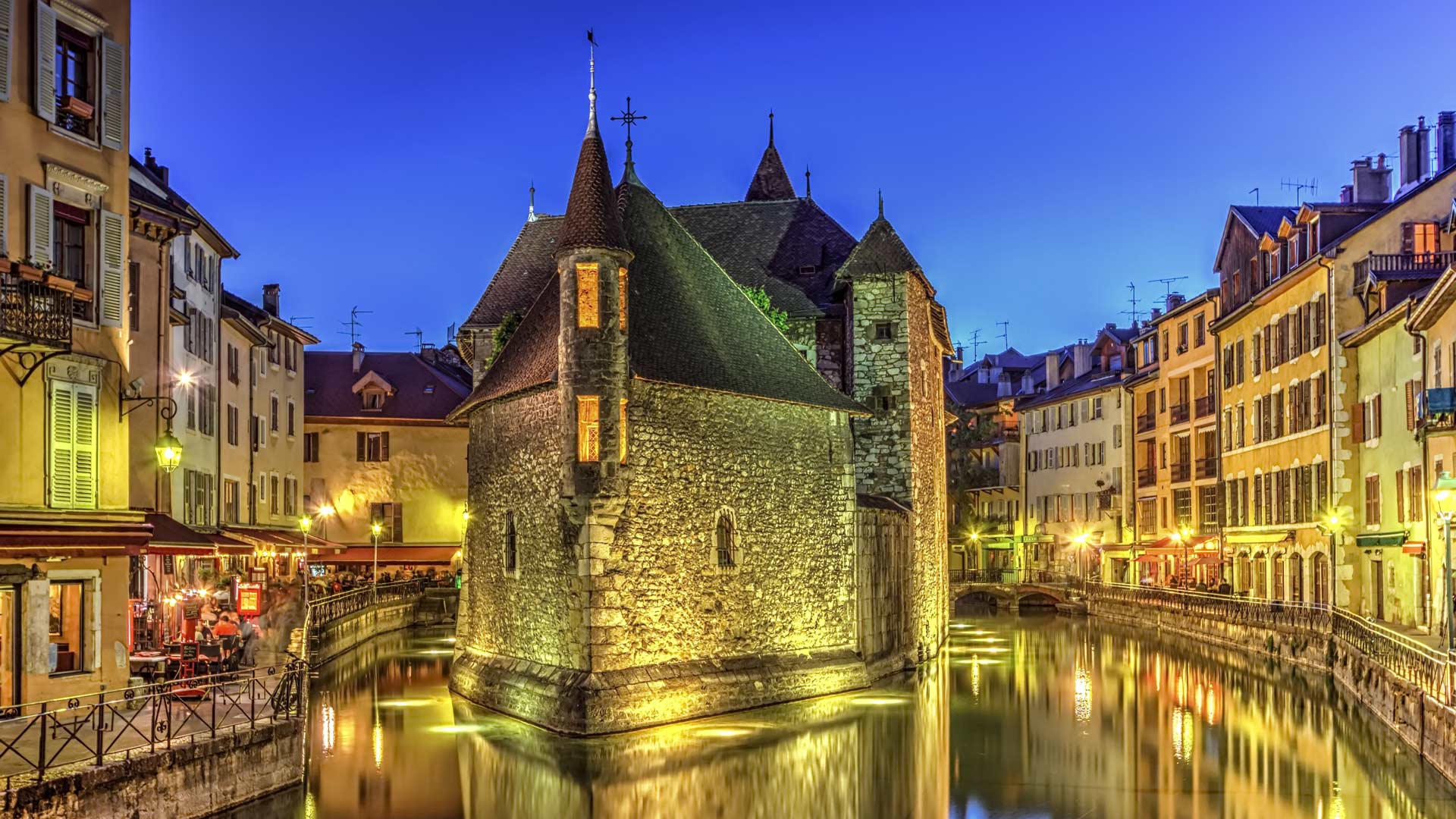 Palais de l'Ile jail and canal in Annecy old city, France, HDR